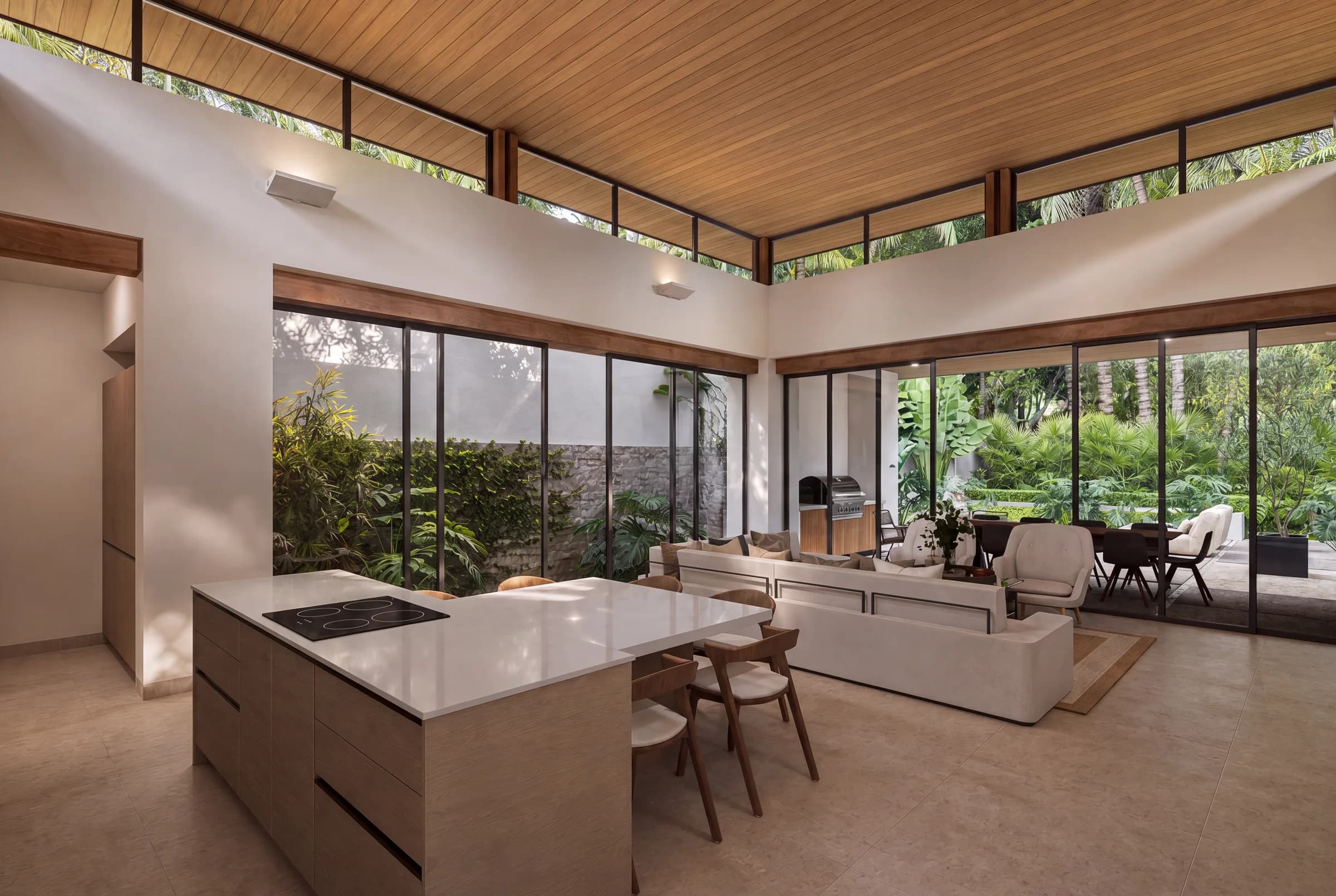 Architectural visualization of a Model C kitchen, living room and garden connection at Sueños del Mar.